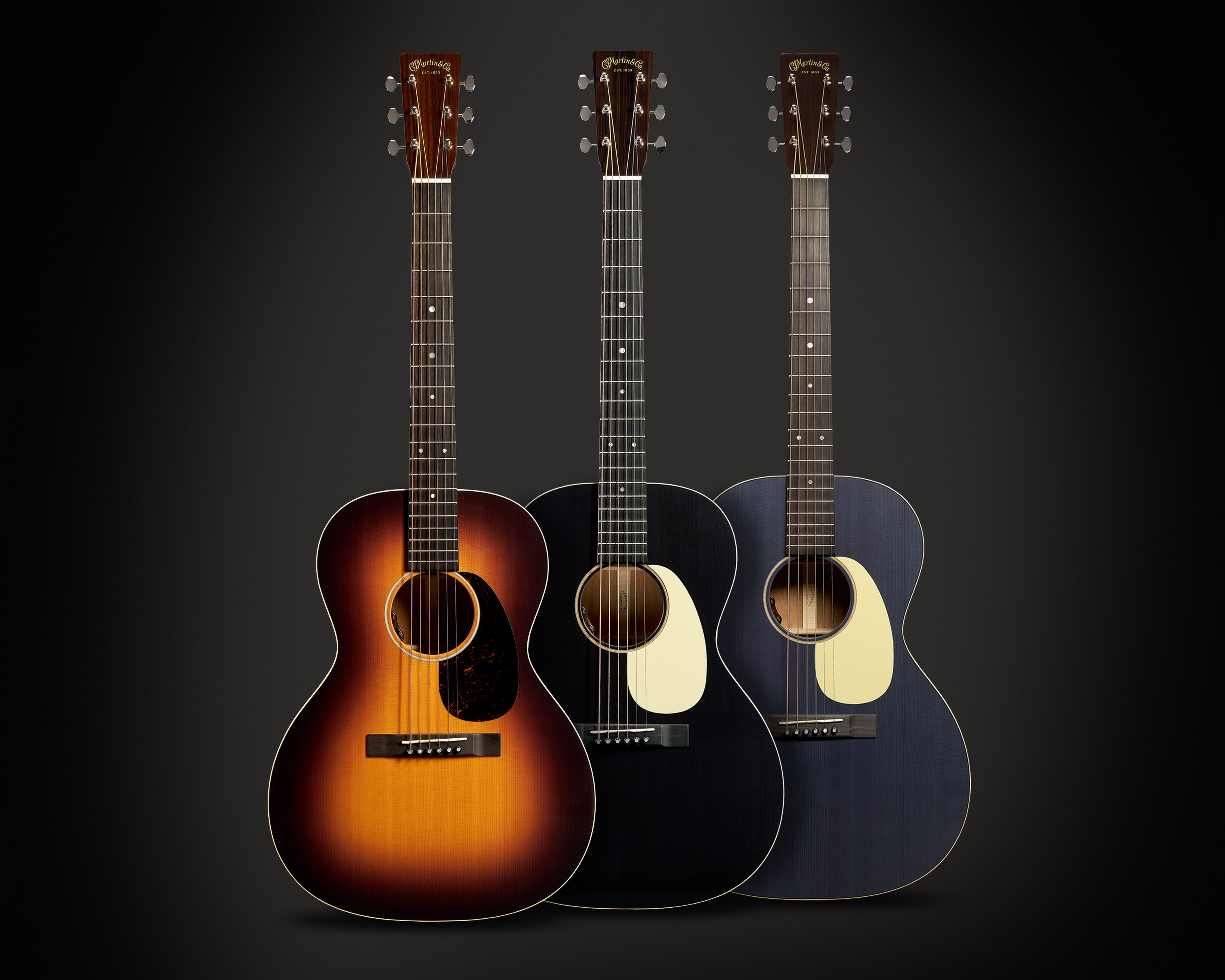Pédale Wah Dunlop Cry Baby Jerry Cantrell I Want Blood édition signature rouge et noire, posée sur une surface usée de type atelier avec des câbles de guitare enroulés autour.
